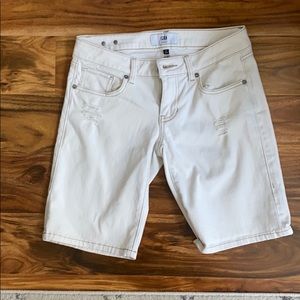 White distressed shorts